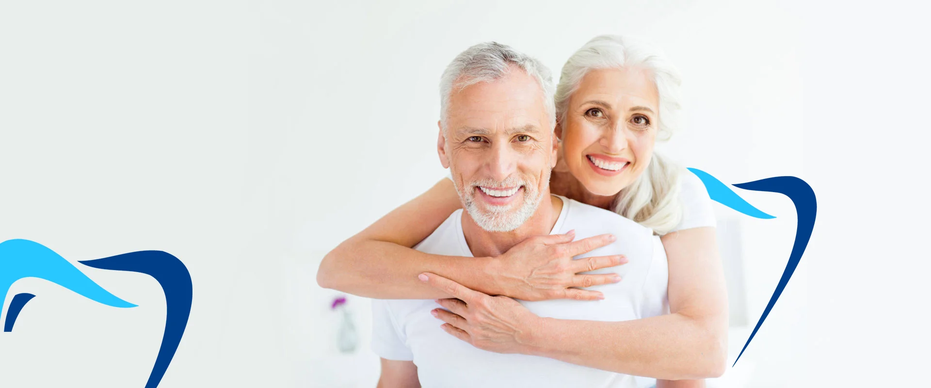 Happy Old Couple smiling after dental treatment